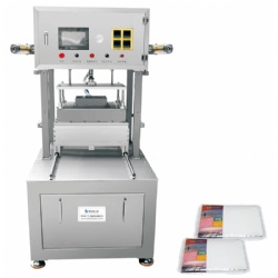 Vertical modified atmosphere locking and sealing machine